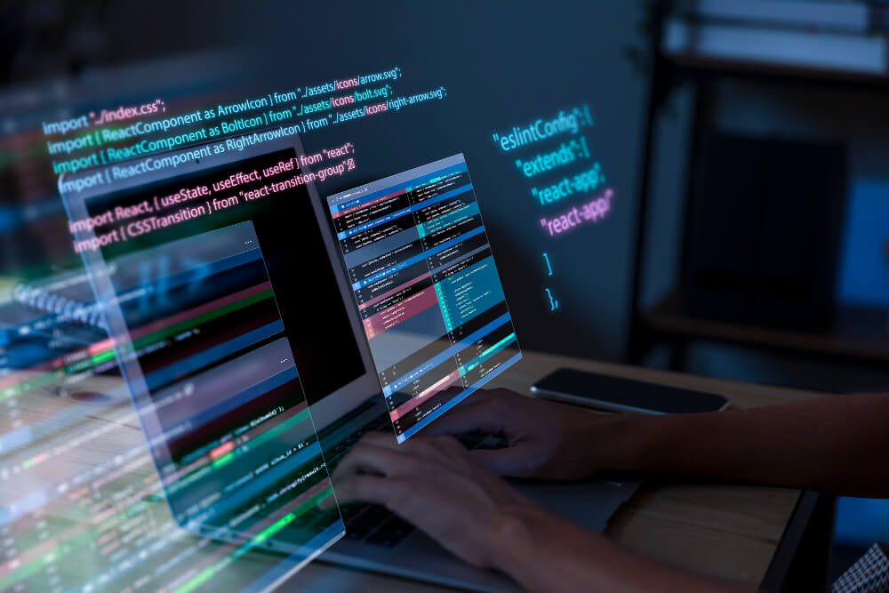 un développeur web qui travaille sur un écran avec plein de données web pour les entreprises